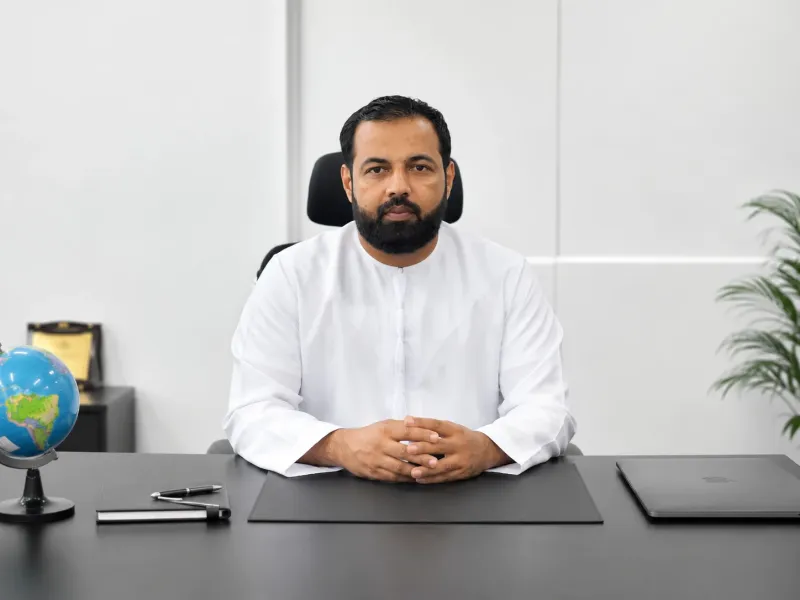 Muhammed Amran, Managing Director, at his desk in the First Link office in Deira