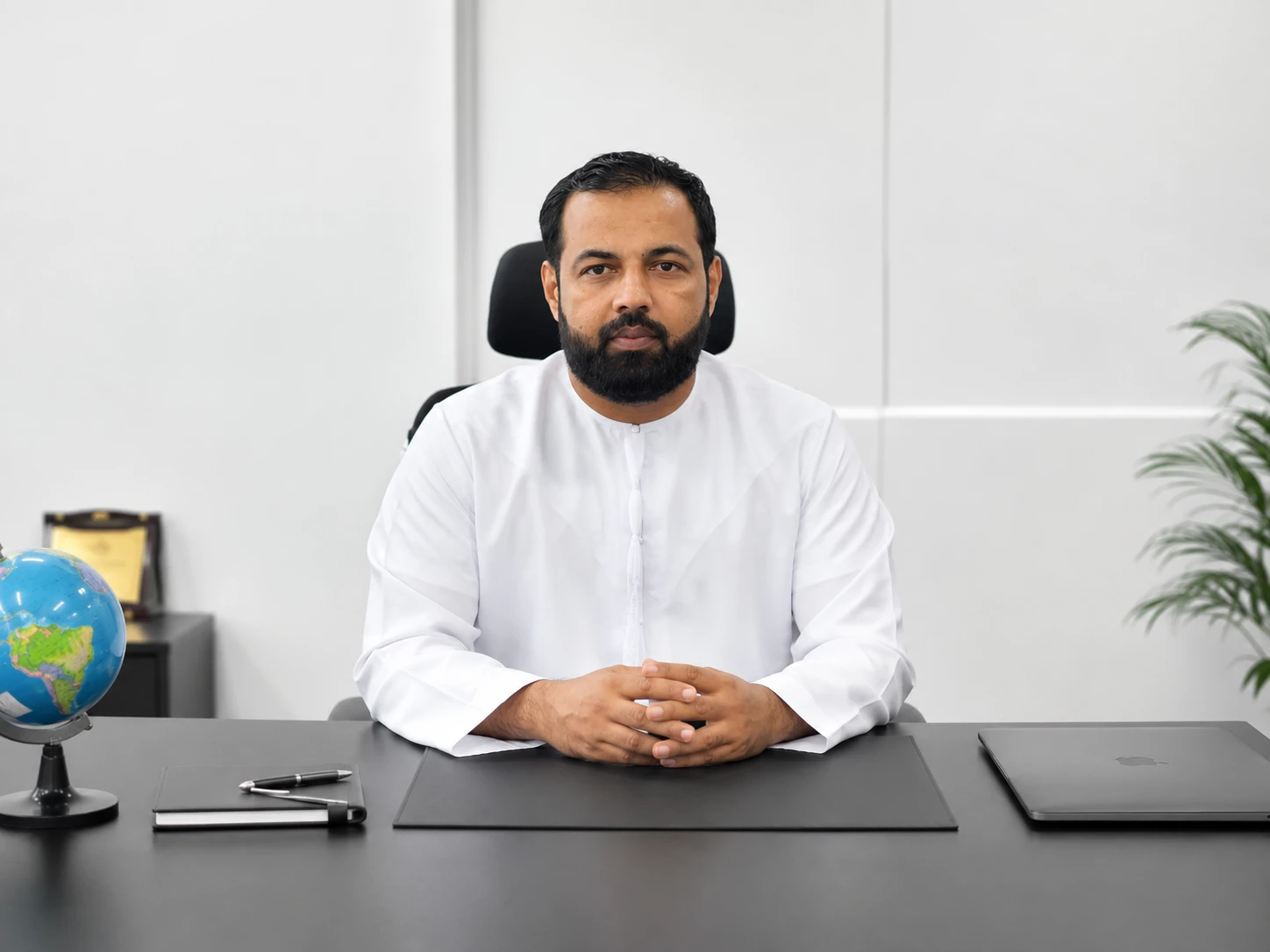 Muhammed Amran, Managing Director, at his desk in the First Link office in Deira